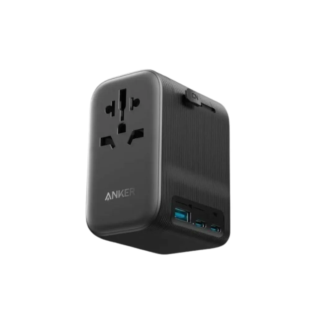 Anker Nano 65W 4-in-1 travel adapter featuring a universal AC socket, two USB-C ports, and one USB-A port in a compact gray design, available at TechHub Computers Nairobi.
