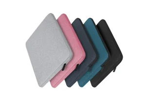 Five assorted colors of slim padded laptop sleeves including Grey, Pink, Navy, Teal, and Black.